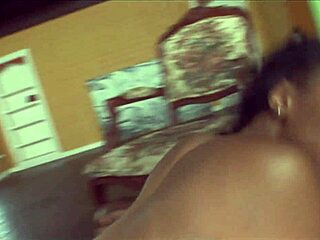 Black performer sliding in hardcore video