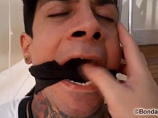 The muscular Brazilian guy gets tied up and gagged during his audition.