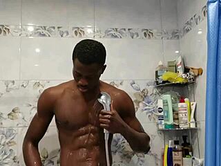 Stepmom sucks cock hard in steamy shower with intense close-up shots.