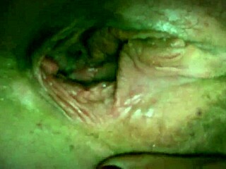 Caught my step mom using my favorite vibrator in the dark, secretly filmed her!