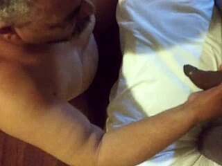 Lesbian Woman Sucks on a Black Shemale's Massive Cock in Passionate Blowjob