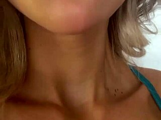 Monika Fox, Russian with pierced nipples and tattoos, teases her big fake tits before porn shoot