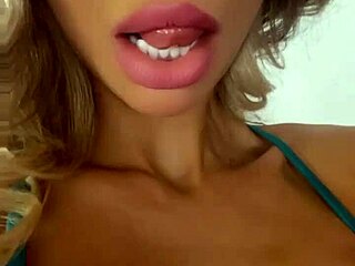 Monika Fox, Russian with pierced nipples and tattoos, teases her big fake tits before porn shoot