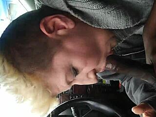 swallowing a black nut treat in intriguing way. it's all about the flavor and texture.