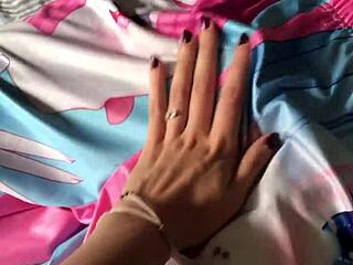 I'm stroking my boyfriend's cock to make my girlfriends jealous.