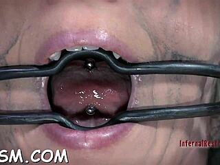 Blonde darling likes to masturbate with a dildo in her bondage setup.