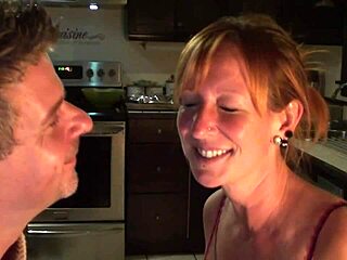 Cute canadian redhead couple shares loving moments in the kitchen. Their bond feels so warm and genuine.
