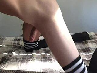 smooth gay boy strokes his cock eagerly