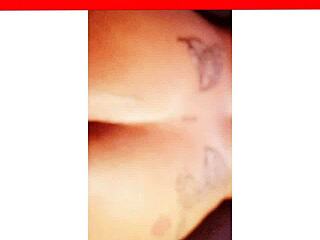 i'm npleasures showing off my new ass tattoo