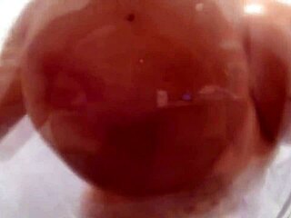 Nikki Benz Soaps Up Her Big Tits Sensually