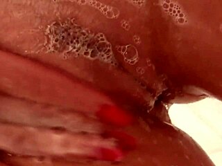 Nikki Benz Soaps Up Her Big Tits Sensually