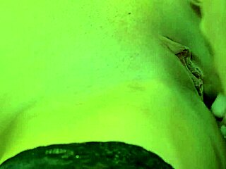 The mature lesbian in black stockings grabbed her partner's hair while getting her pussy licked