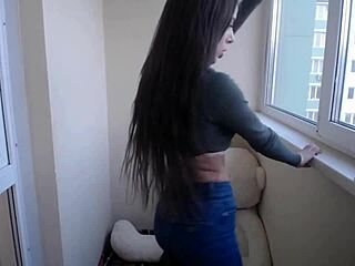 In a casual outdoor setting, cute Tanya shows her small wet tits on webcam.