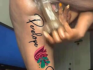 Ebony solo masturbation leads to intense squirting.