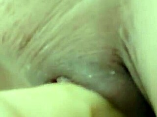 mature turkish lady slides dildo in wet slit