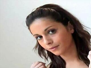 The brunette babe in lingerie teases with cuffs and naughty panties, commanding her boy to submit.