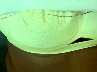 Aparna wearing petticoat and panties in a simple movement video.