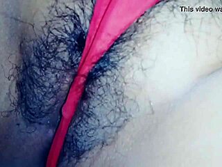 Showing my wife in her red thong outfit