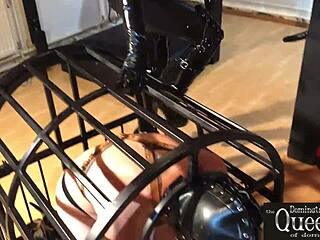 Queen Dominatrix Frida Cage Locks Submissive In Chastity Cage