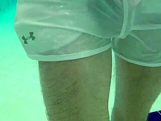 I, Xnxxjohn, see thru the pool boy's monster cock underwater.