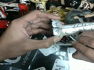 it's time to wrap up painting the little grey alien with dildo art for business