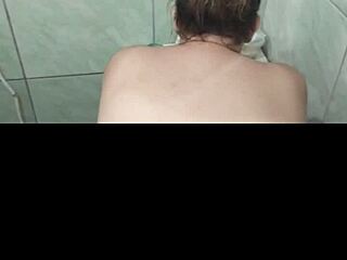 In the bathroom, the wife enjoys a big ass bath with amateurs.