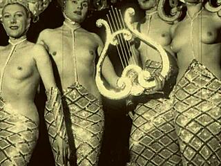 vintage showgirls in antique striptease with clothes ripped