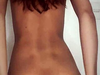 she's lonely and fucking her beautiful pussy with a dildo, bent over and masturbating to orgasm