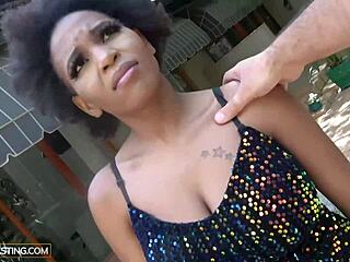 African casting - busty ebony in sequin dress impressed by the size