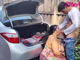 A mature and sensual stepmother seduces a young man in a car outdoors