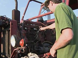 Valentina keeps her skirt on during anal sex outside by the tractor.