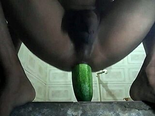 Hot gay man enjoys anal sex with cucumber