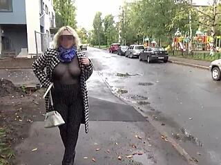 Mature milf in nylon walks outdoors suggestively