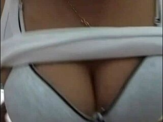 em ngực bự shows off big tits on webcam.