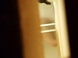 Spying on Her Shaving Her Hairy Pussy