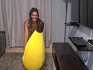 tattooed indian slut humps banana in close-up