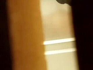 Spying on Her Shaving Her Hairy Pussy