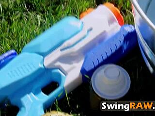 Swinger couple explores fun games under the summer sun.