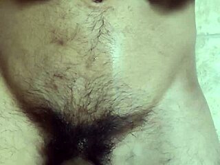 Gay man plays with his belly button and cums