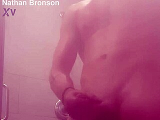 Steamy shower scene of the bodybuilder washing up and pleasuring himself