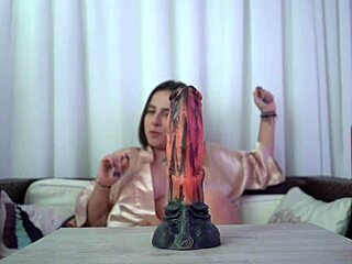 sexy nataly fantasizes while working a huge dildo deep