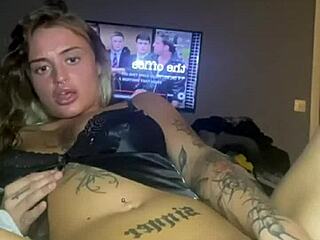 Slutty goth babe with huge tits fingers herself raw.