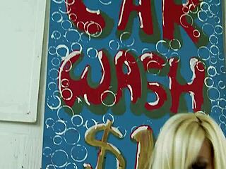 Nympho Lesbians at Car Wash Can’t Resist Dildos. They Make Each Other Cum Hard!