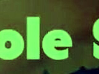 Redhead with big tits sucks massive dicks at the gloryhole for wild fun