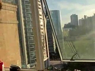 Brazilian couple gets naughty by the window for neighbors to see