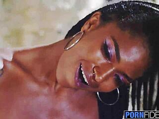 pornfidelity showcases ebony actress tina fire with big natural tits in a sensual scene