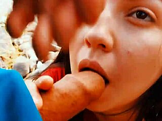 A couple risks a passionate blowjob in the open nature outdoors