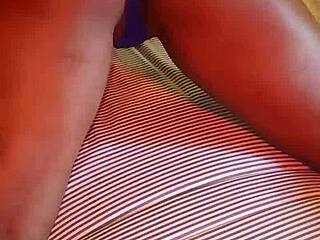 Slipping into blue lingerie, I head to bed for a little self-touch.