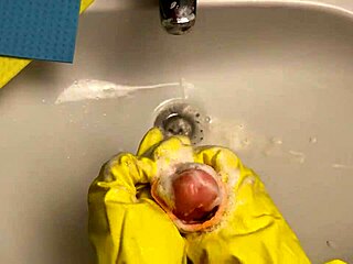 I love watching this hot housewife clean her dildo after play