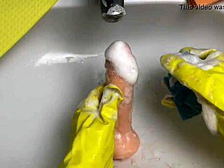 I love watching this hot housewife clean her dildo after play